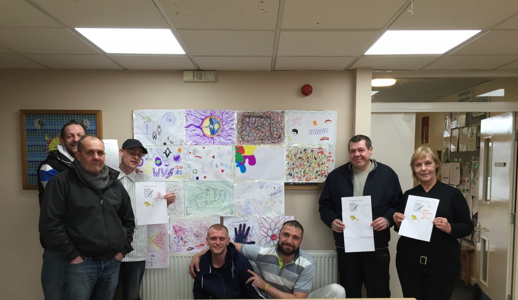 Service users with the artwork they created during their Mindfulness session
