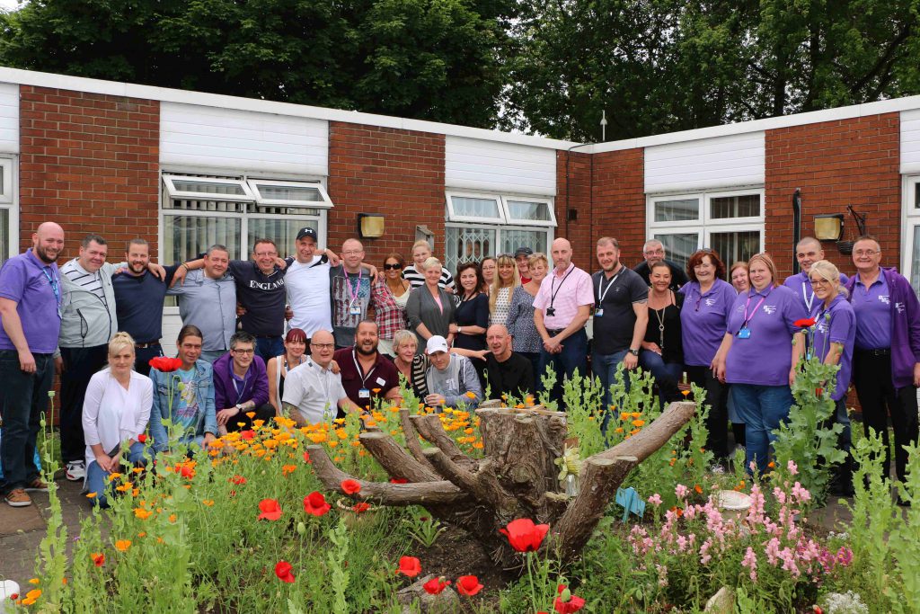 Service users, their families and Aspire staff celebrate recovery at the event held at New Beginnings.