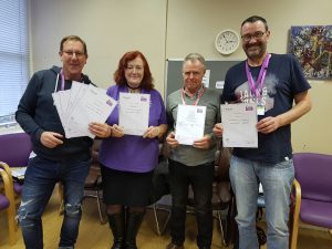 Aspire peer mentors with their certificates