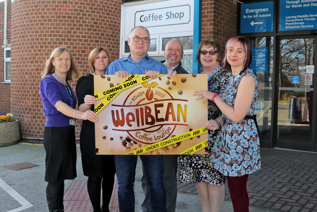Members of joint RDaSH, Aspire, and Flourish Enterprises WellBean Coffee Lounge project team pictured outside Tickhill Road Hospital.