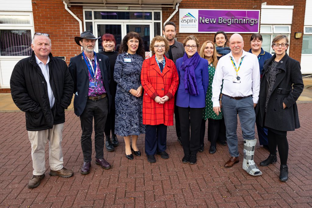 PHOTO: Dame Carol Black is pictured (seventh from the right); with Chair of Rotherham Doncaster and South Humber NHS Foundation Trust (RDaSH), Kathryn Lavery, (centre); RDaSH Interim Chief Executive Sheila Lloyd (fourth left); Tim Young, Alcohol and Drug Service Chief Executive (second right); and Stuart Green, Aspire Service Manager (third left); and colleagues from Aspire, RDaSH and partner organisations.